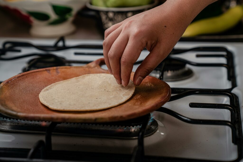 A Tortilla on a Brown Wooden Plate